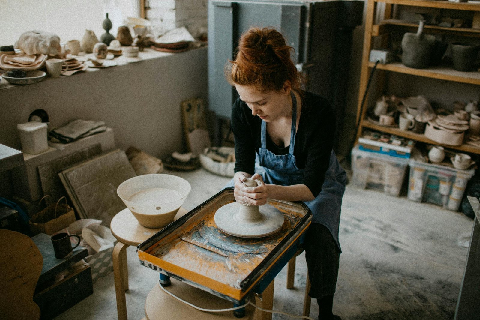 Woman Holding Clay