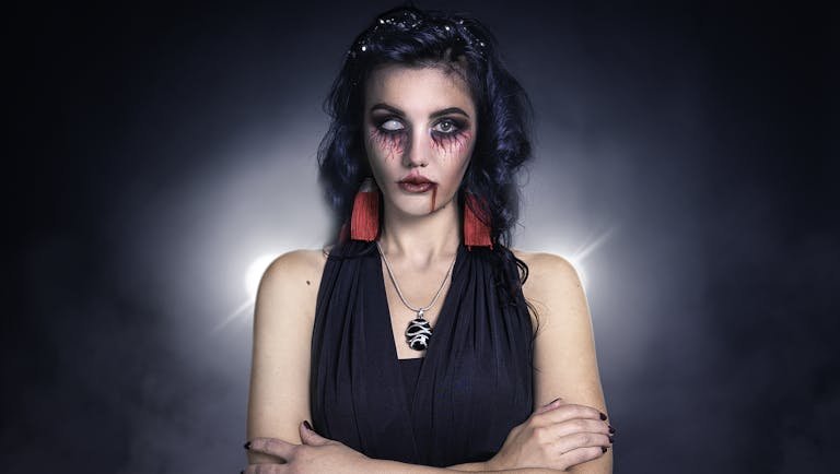 Woman in a Halloween Costume and Makeup