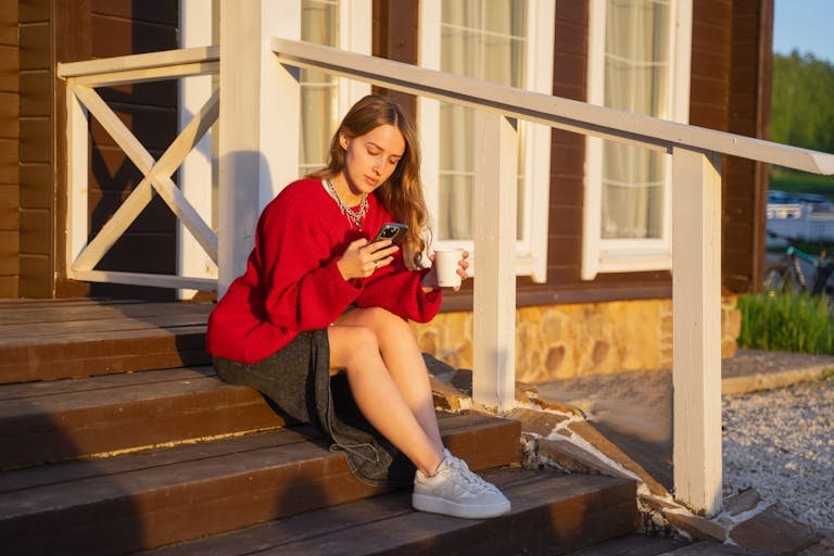 Brunette Woman Sitting on Stairs