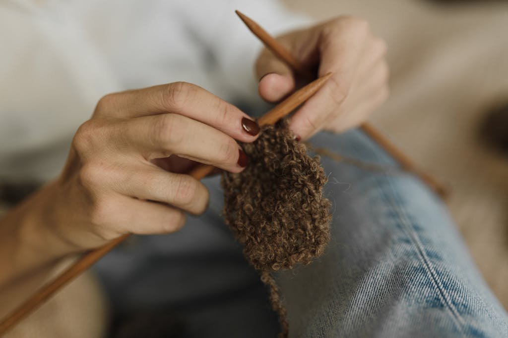 Close Up Shot of a Person Knitting