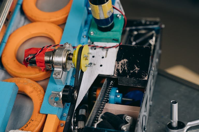 Detailed shot of gears and electronics in a machinery setup.